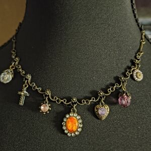 Vintage-Inspired Gold Charm Necklace with Orange and Purple Accents